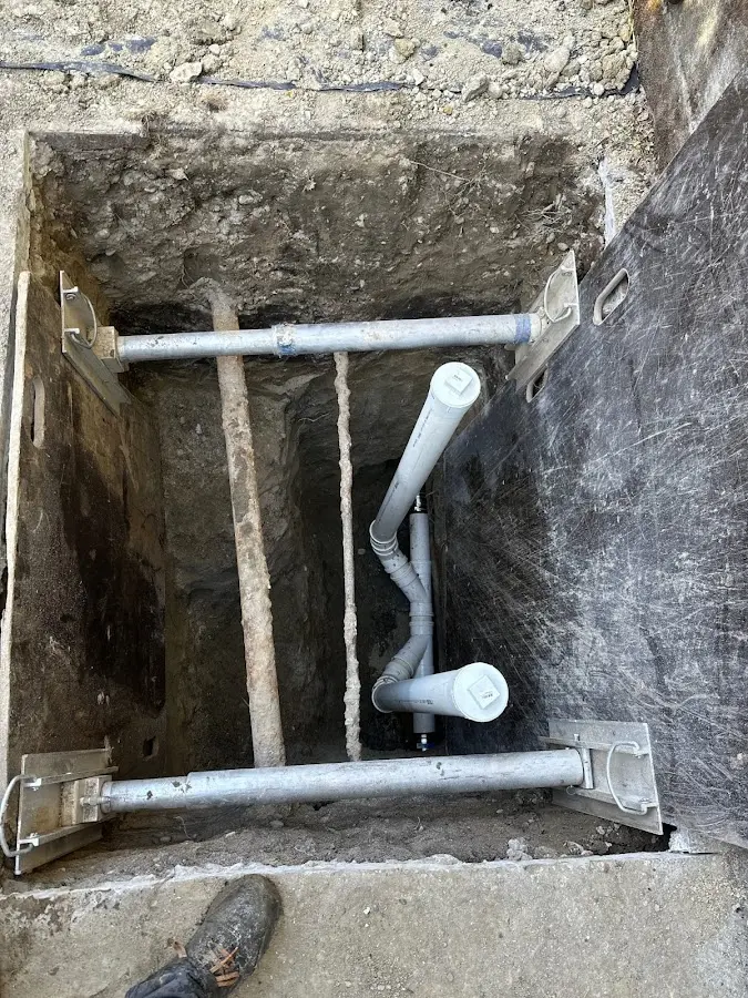 Experienced plumber completing Drain Cleaning work in Ferris